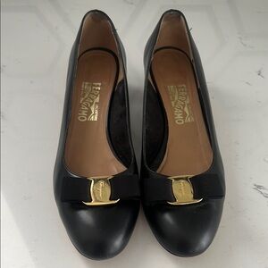 Salvatore Ferragamo Black Flats with Gold Vara Bow